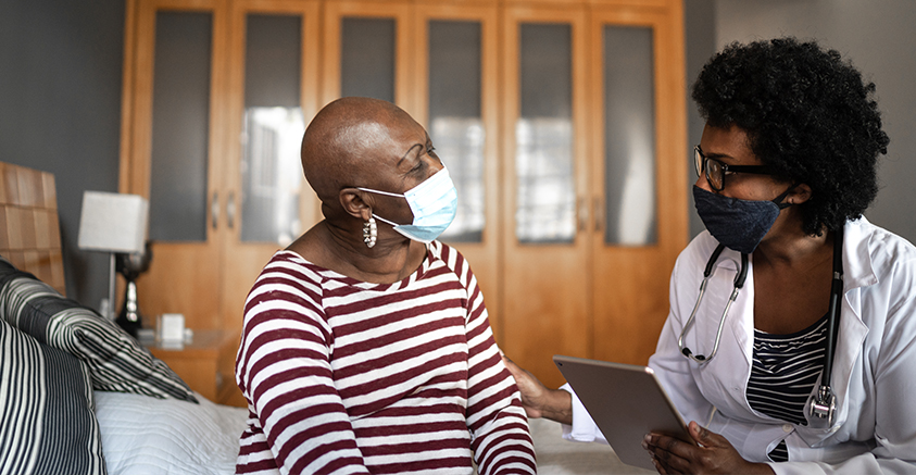 nurse and patient meeting in home